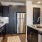 Spacious kitchen with granite countertops and stainless steel appliances